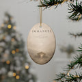 IMMANUEL Matthew 1:23 ceramic nativity ornament hanging on a Christmas tree - DECIDED.