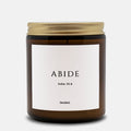 ABIDE scripture candle with John 15:4 label in a 9oz amber glass jar with gold lid - DECIDED.
