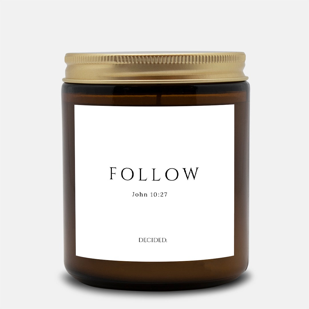 FOLLOW scripture candle with John 10:27 label in a 9oz amber glass jar with gold lid - DECIDED.
